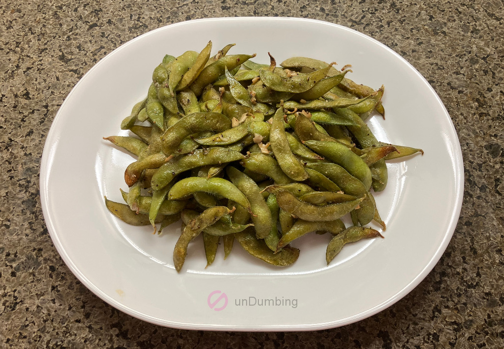 Simple roasted edamame on a white plate (Try 2)