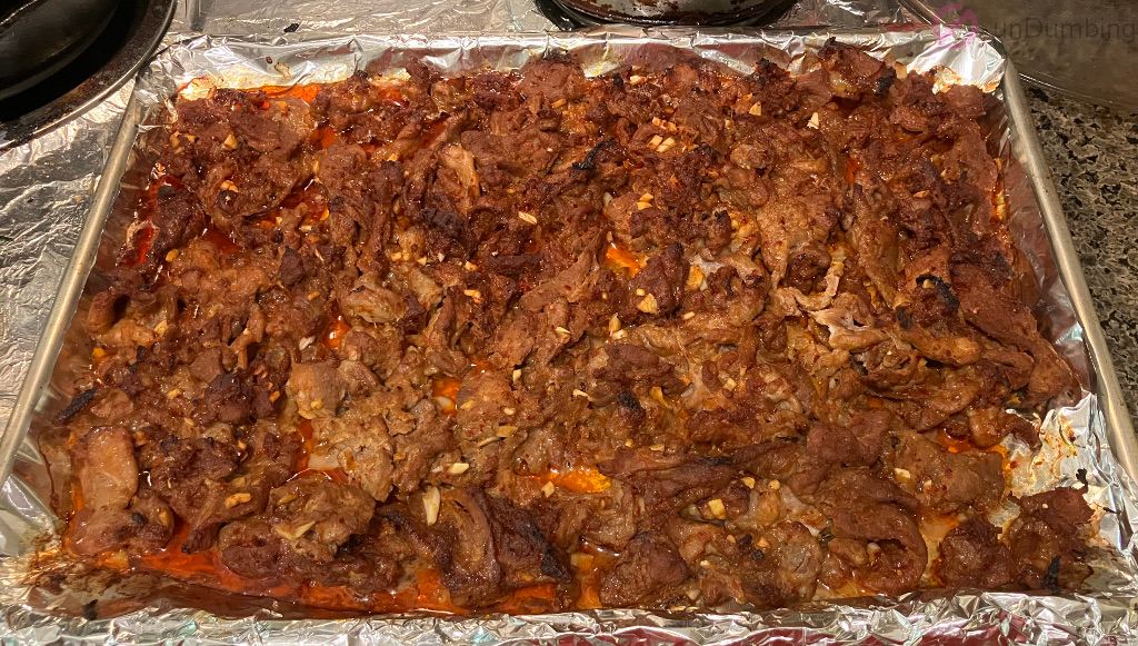 Pork done on a baking sheet